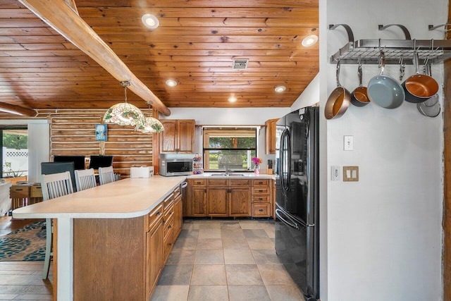 kitchen with wooden ceiling, a kitchen breakfast bar, log walls, decorative light fixtures, and black fridge with ice dispenser