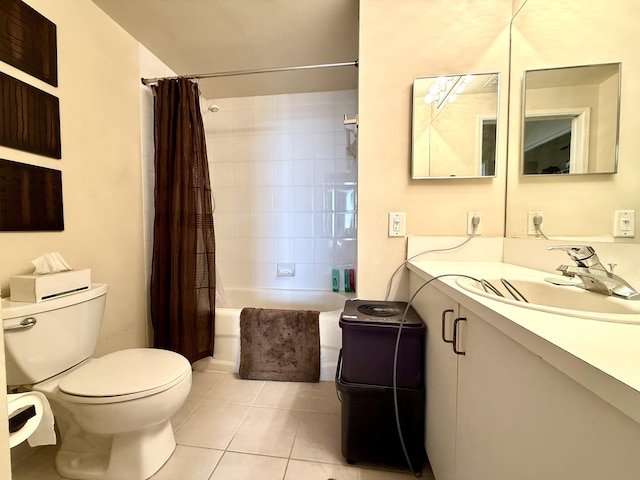 bathroom with tile patterned floors, vanity, toilet, and shower / bath combo with shower curtain