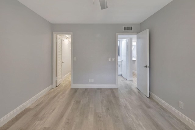 empty room with light wood-type flooring