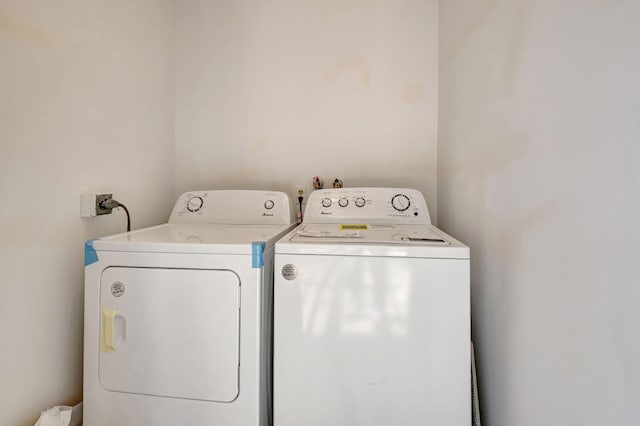 laundry area featuring washing machine and dryer