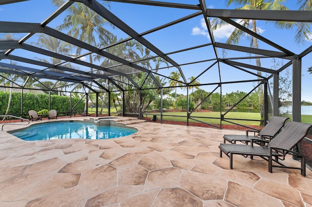 view of swimming pool with a patio area, an in ground hot tub, and glass enclosure