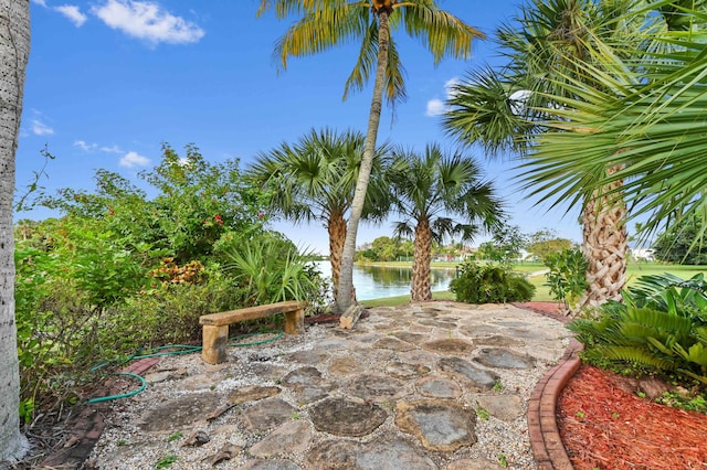 view of patio / terrace with a water view