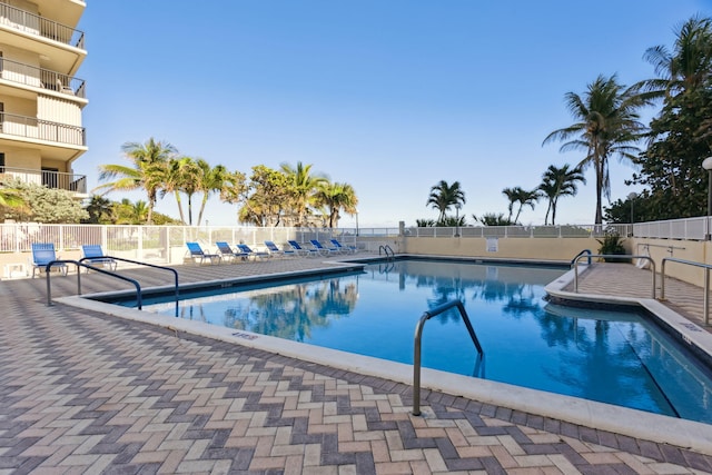 view of pool featuring a patio area