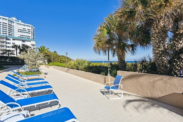 view of patio with a water view