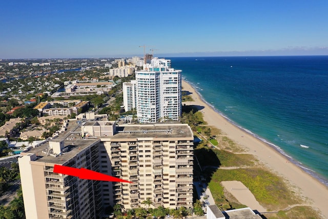 bird's eye view with a view of the beach and a water view