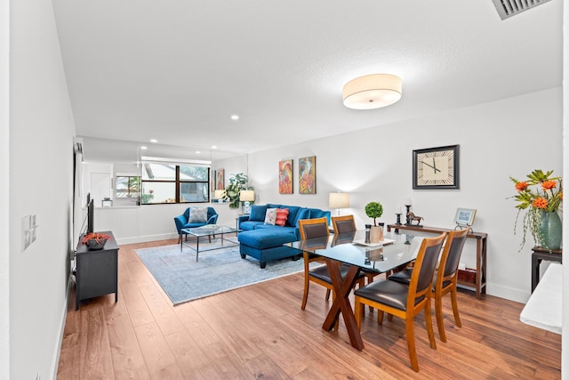 dining space featuring light hardwood / wood-style flooring