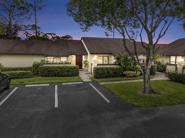 view of front of home featuring a yard