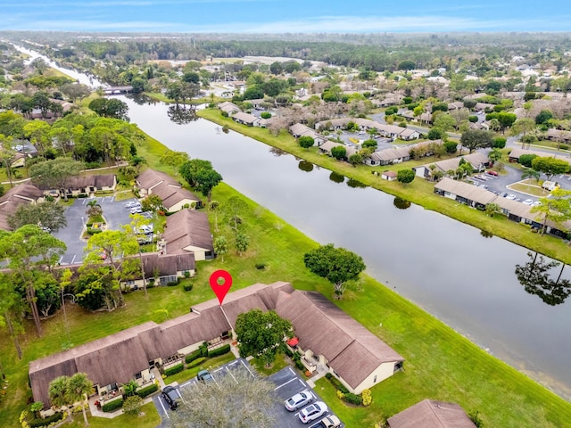 bird's eye view with a water view