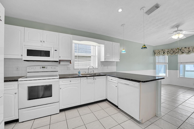 kitchen featuring kitchen peninsula, white appliances, ceiling fan, white cabinetry, and hanging light fixtures