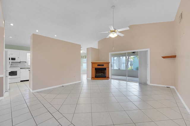 unfurnished living room with ceiling fan, light tile patterned floors, and high vaulted ceiling