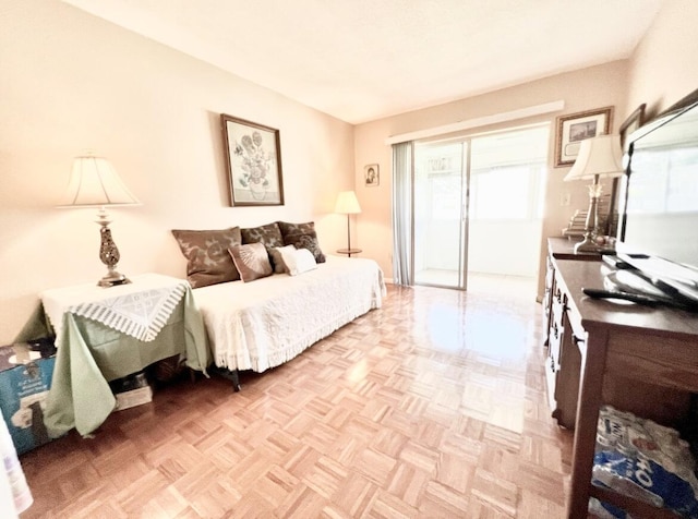 bedroom featuring light parquet floors