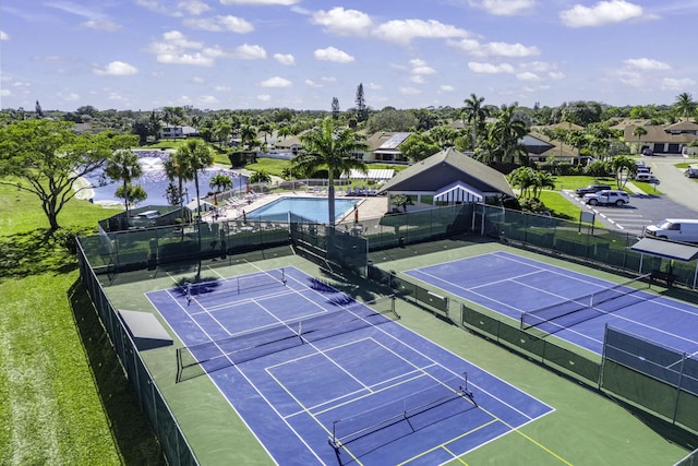 view of sport court featuring basketball hoop