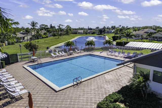 view of swimming pool featuring a patio area