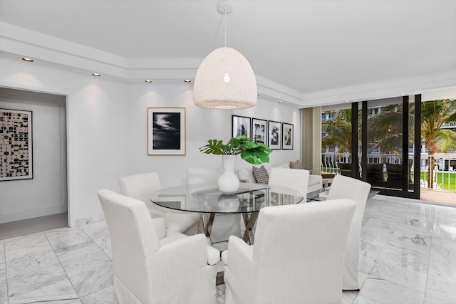 dining area with expansive windows