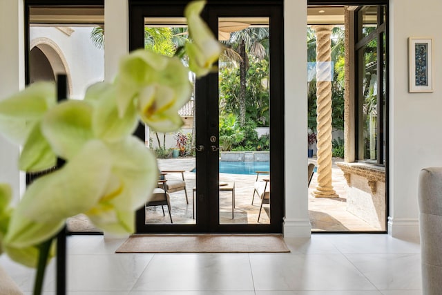 entryway featuring french doors