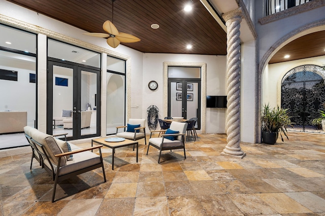 view of patio / terrace with an outdoor living space, french doors, and ceiling fan