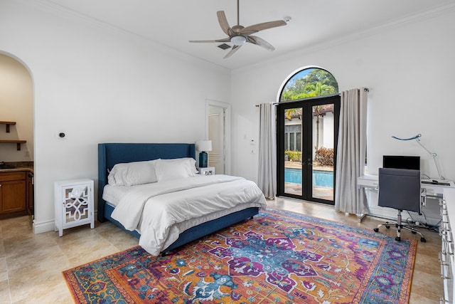 tiled bedroom with french doors, access to exterior, multiple windows, and crown molding