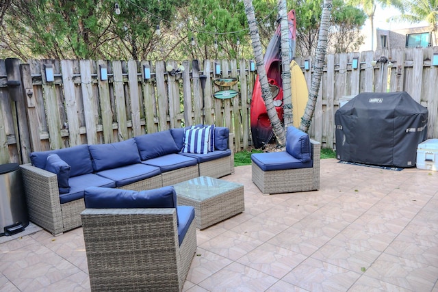 view of patio / terrace featuring a grill and an outdoor hangout area