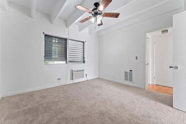 carpeted empty room with beamed ceiling, ceiling fan, and a wall mounted air conditioner