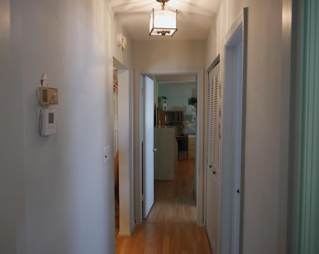 corridor featuring light hardwood / wood-style flooring