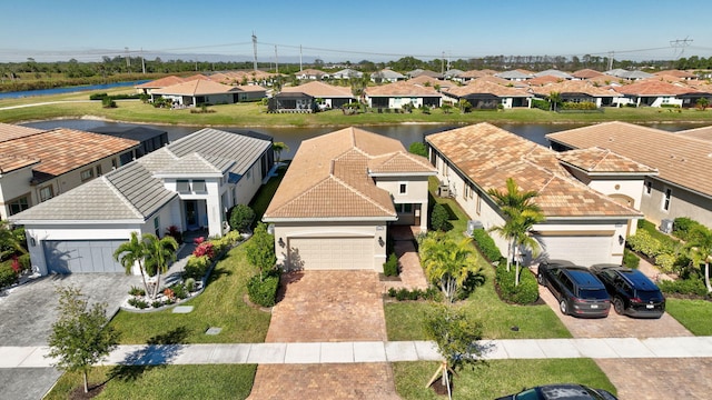 aerial view featuring a water view