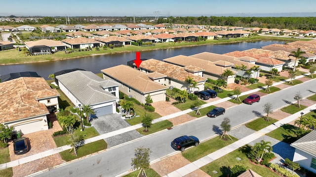 bird's eye view with a water view