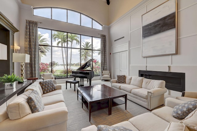 living room with a towering ceiling