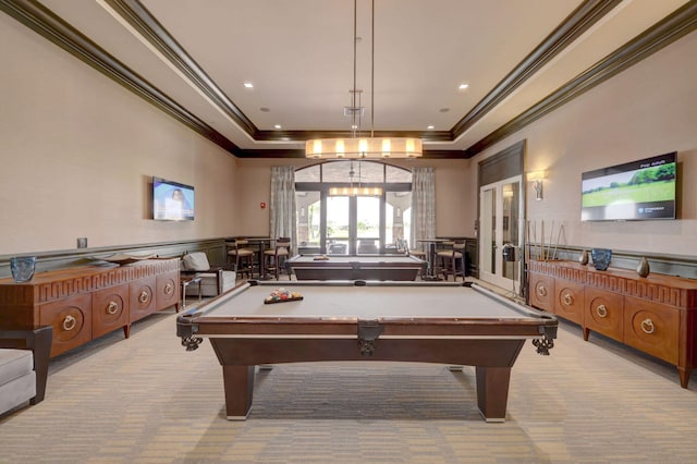 game room featuring light colored carpet, ornamental molding, a raised ceiling, and billiards