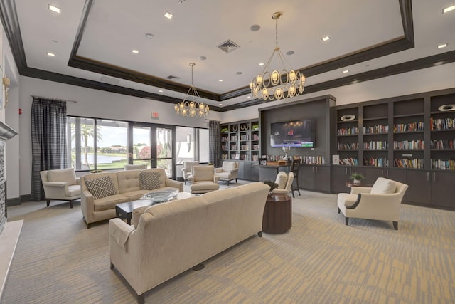 carpeted living room featuring crown molding and a tray ceiling