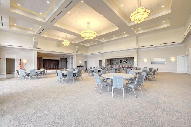 carpeted dining room with coffered ceiling, ornamental molding, beamed ceiling, and a high ceiling