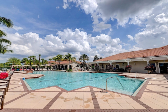 view of swimming pool featuring a patio