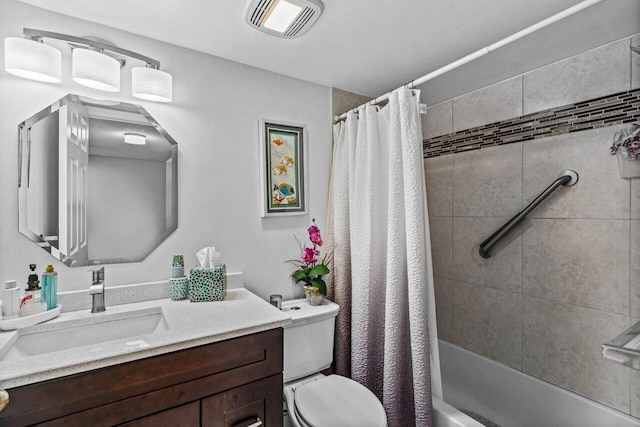 full bathroom with shower / bath combination with curtain, vanity, and toilet