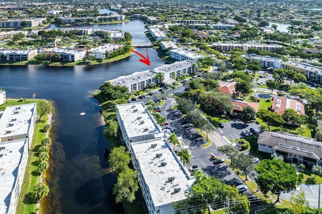 drone / aerial view with a water view