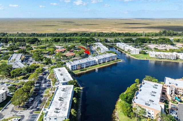 drone / aerial view featuring a water view