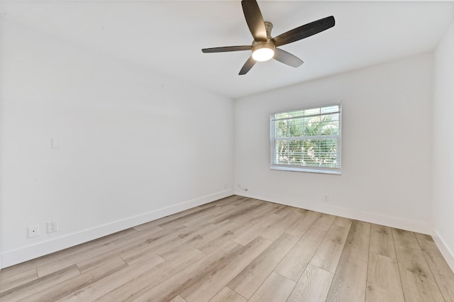 unfurnished room with ceiling fan and light wood-type flooring