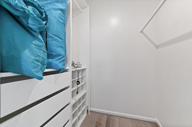 walk in closet featuring light wood-type flooring