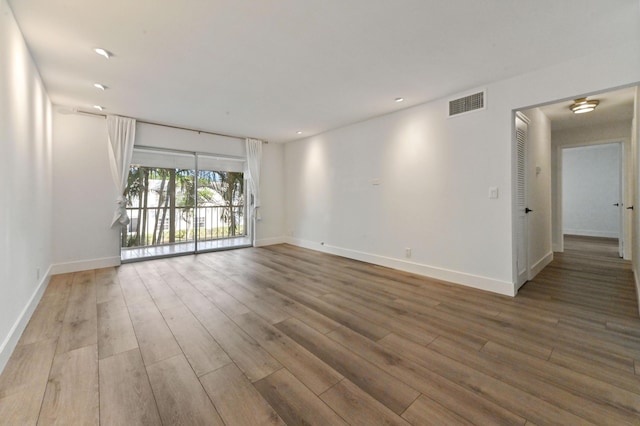 empty room with light wood-type flooring