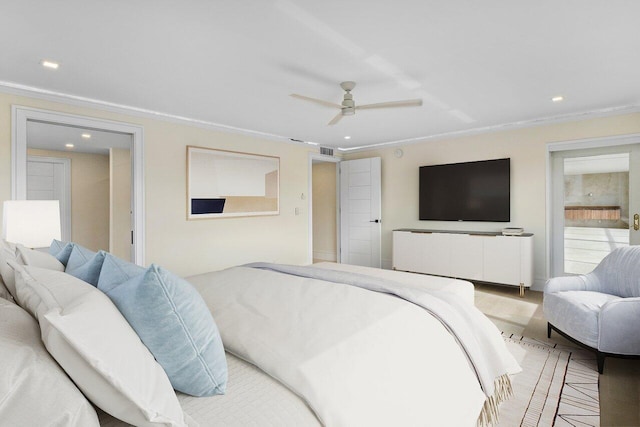 bedroom with ceiling fan, ornamental molding, and light wood-type flooring