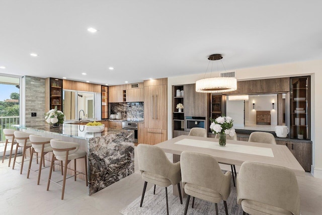 dining space featuring sink