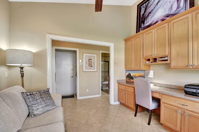 bedroom with a closet, light hardwood / wood-style floors, and ceiling fan