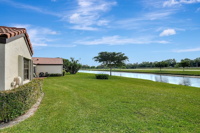 view of yard with a water view