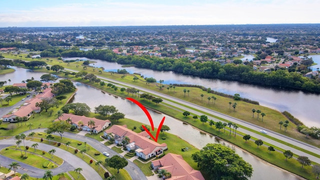 drone / aerial view featuring a water view