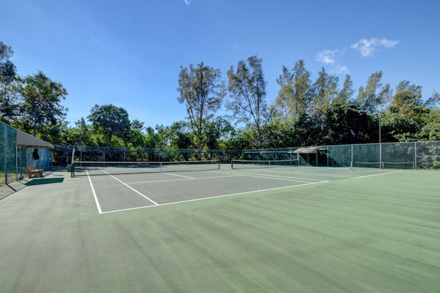 view of tennis court with basketball court