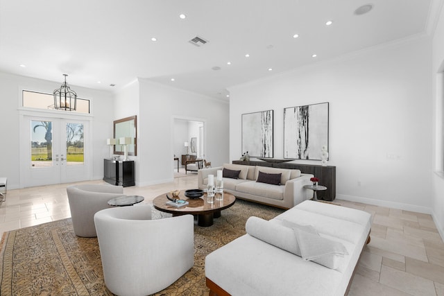 living room with crown molding, french doors, and an inviting chandelier