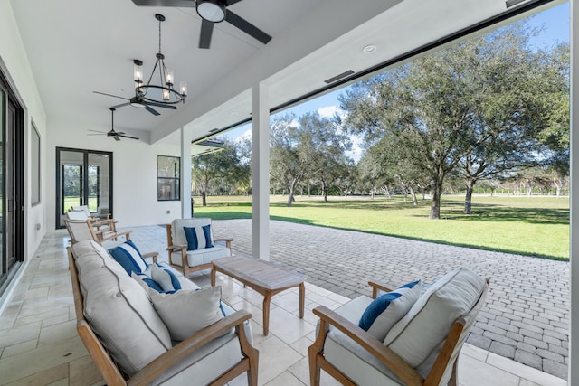 view of patio / terrace featuring ceiling fan and an outdoor hangout area