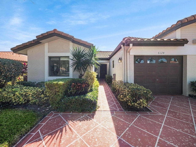 view of front of property with a garage