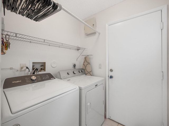 washroom with washer and clothes dryer