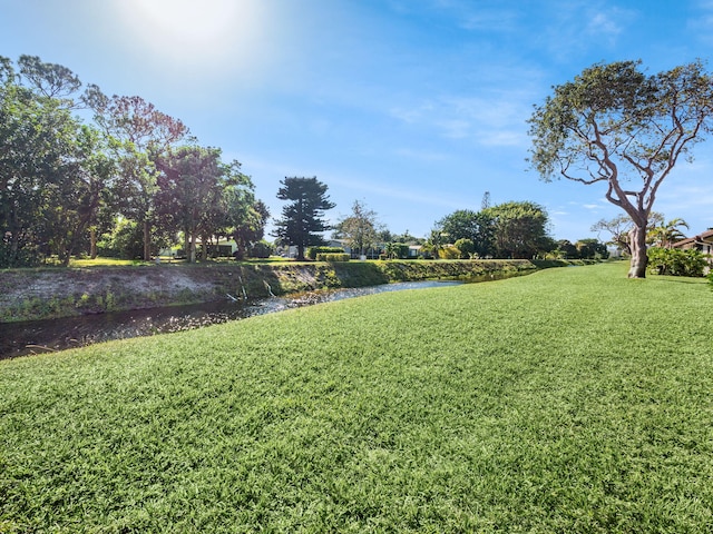 view of yard featuring a water view