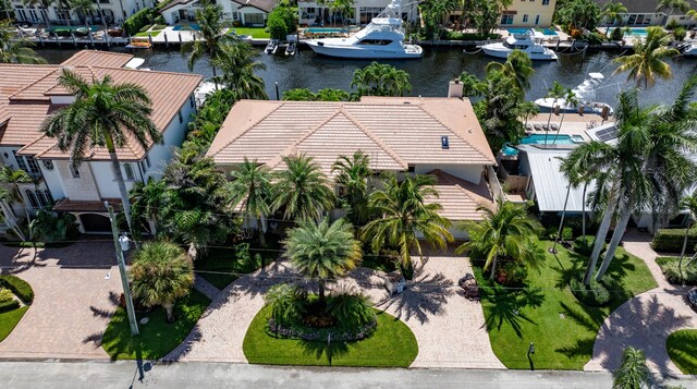 birds eye view of property with a water view