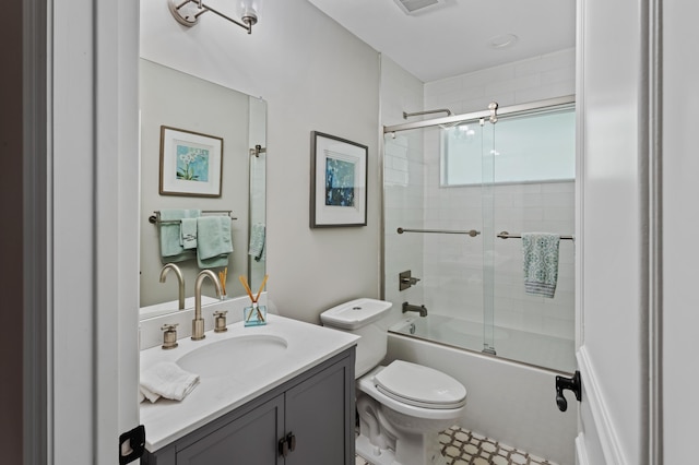 full bathroom with vanity, toilet, and enclosed tub / shower combo